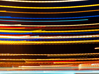Colorful streaks of light illuminating night sky