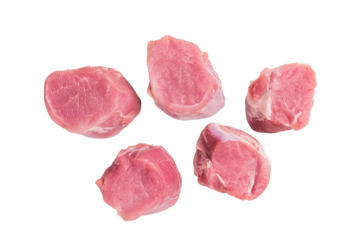 Uncooked pork loin medallion, cut tenderloin ready to be seasoned and cooked into a delicious gourmet dish. isolated on white background. top view