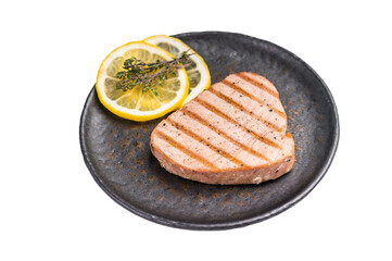 Deliciously charred grilled tuna steak, served with fresh herbs, a healthy and flavorful choice for...
