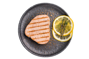 Deliciously charred grilled tuna steak, served with fresh herbs, a healthy and flavorful choice for...