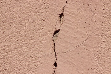 A close up of a cracked wall
