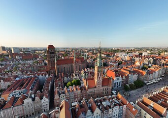 Aerial photo taken by drone over the historic tourist center of Gdansk, the city hall and the cathedral on a summer day, Poland, Europe