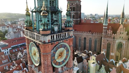 Aerial photo taken by drone over the historic tourist center of Gdansk, the city hall and the cathedral on a summer day, Poland, Europe