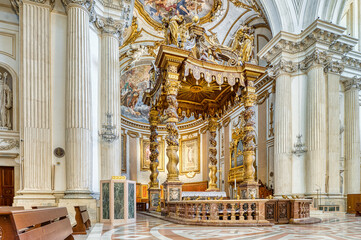 The interior of San Feliciano Cathedral in Foligno, Italy, features a stunning Baroque altar and baldachin, inspired by St. Peter’s Basilica.  © Lorenzo Dottorini