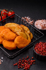 Crispy chicken nuggets, meat takeaway meal with salt. Chicken nuggets, fast food