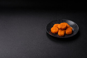 Crispy chicken nuggets, meat takeaway meal with salt. Chicken nuggets, fast food