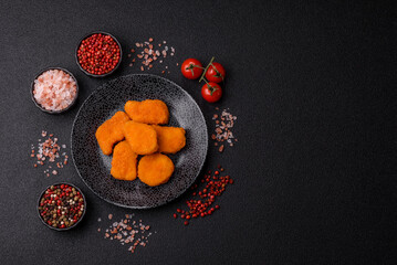 Crispy chicken nuggets, meat takeaway meal with salt. Chicken nuggets, fast food