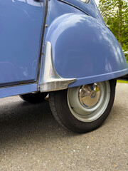 Tire and fender of antique purple car
