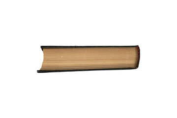 Small old book with black cover viewed from the side is isolated.