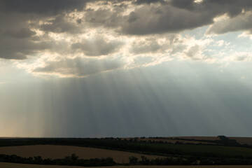 A landscape with a cloudy sky