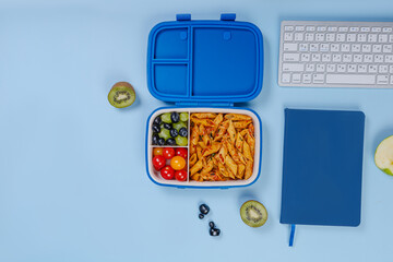 Lunch boxes with food ready for work or school.