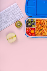 Lunch boxes with food ready for work or school.