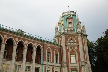 Naklejka premium View of the royal old palace in the park in Moscow city under with windows and arches on summer day blue sky