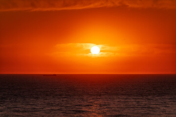 Beautiful red and orange sunrise over the sea.