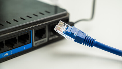 The internet cable is pulled out of the router. 