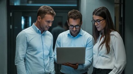 Teamwork using laptop for business in office corridor for collaboration - Powered by Adobe