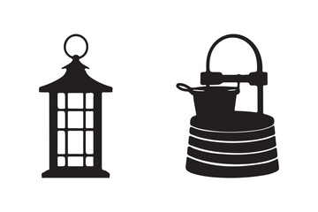 Silhouettes of a vintage lantern and a camping stove