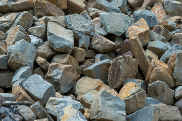 Natural and rough stone background, gray stone background, wide spread gray pebble background