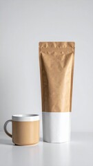 Kraft Coffee Pouch Mockup With Ceramic Mug On White Table Against White Backdrop