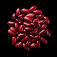 Vibrant red kidney beans arranged in pile against dramatic black background, showcasing glossy texture and natural shape for healthy cooking ingredients and plant protein source