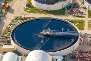 Industrial water treatment facility with water cleaning cisterns and piping system