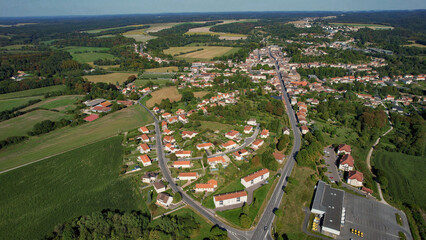 An Aerial panorama view with pan of the old town around the city Saint-Menehould in France on a...