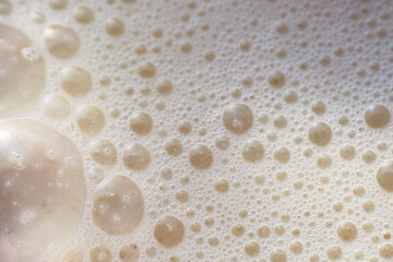 Extreme close up of milk froth as background