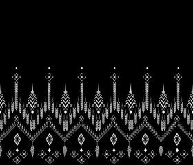 Ethnic abstract background. Seamless pattern in tribal, folk embroidery, and Thai style. Aztec geometric art ornament print.Design for carpet, wallpaper, clothing, wrapping, fabric, cover, textile 