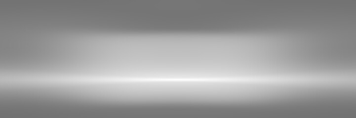 long soft gray studio room background, wide grey floor backdrop with spotlight.