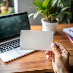 Hand Holding a blank business Card mockup