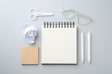 Flat lay composition with notebook on gray background