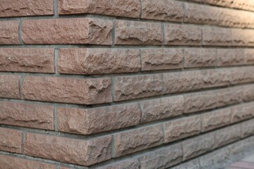 Texture of red brick wall as background, closeup