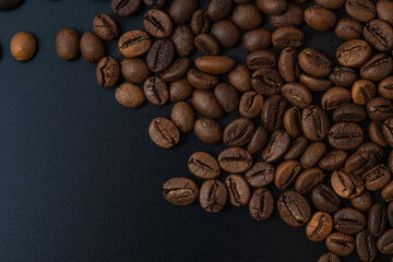 Scattered coffee beans on the side