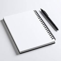 Blank Notebook and Pen on a White Surface, Ready for Writing.