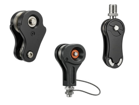 cable tensioner, three black pulleys with different designs and functional elements isolated on transparent background 
