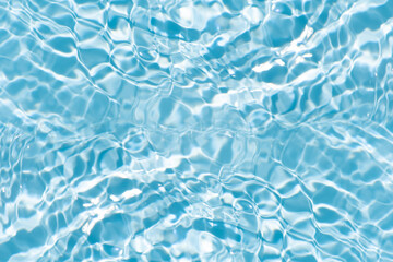 Blue water with ripples on the surface. Defocus blurred transparent blue colored clear calm water...