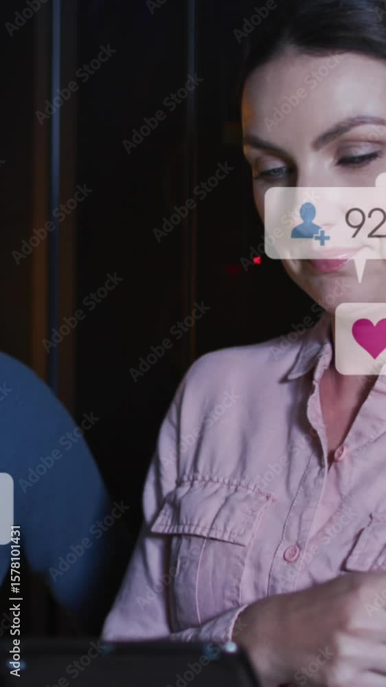 Aufkleber animation of social media icons and numbers over diverse it technicians by computer servers