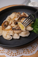 Classic potato dumplings with fried toppings