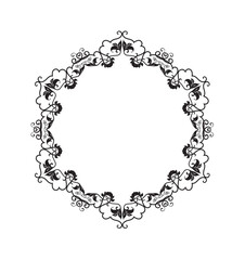 Ornate, circular decorative frame with intricate floral and scrollwork design.