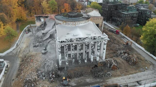 Aerial view of demolition process of abandoned historical Trade Union Hall building located on Tauras hill. Vilnius, Lithuania