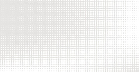 This image presents a modern gray gradient halftone pattern that features a symmetrical arrangement of circular dots, creating a visually engaging and textured effect on a white backdrop