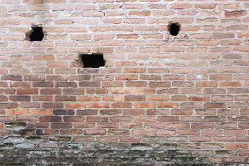 Brick fence wall with old texture brown background