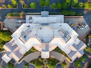 Sunset Drone Images of Large TPO Roofs on Commercial Buildings and Apartments: Architecture, Industry, Engineering
