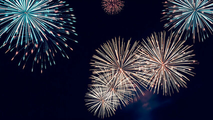 Fireworks display illuminating the night sky with bursts of color and light explosions celebration