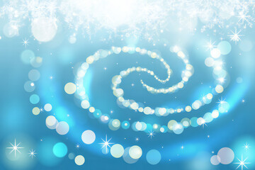 Shimmering circles and glowing sparkles create a dreamy light blue and white bokeh effect for...