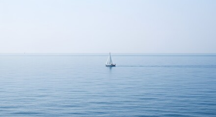 Obraz premium Sailboat on a Calm Sea