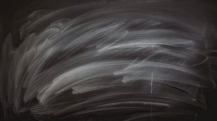 Distressed blackboard surface with residual chalk traces for abstract background