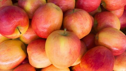Fresh ripe red apples background. Top view of natural apples