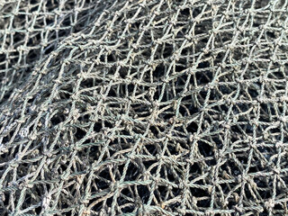 texture of gray fishing net.