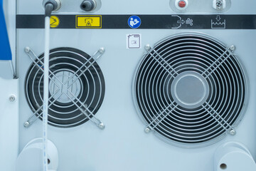 Interior of metal sheet manufacturing equipment and machines in production line.